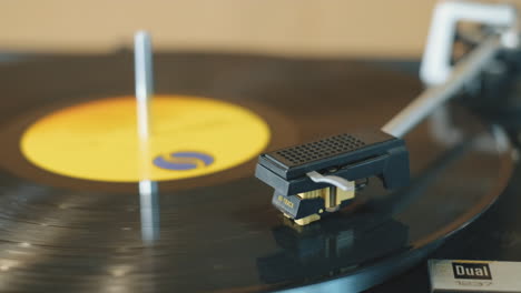 Stationary-shot-of-a-vintage-vinyl-record-spinning-on-a-turntable