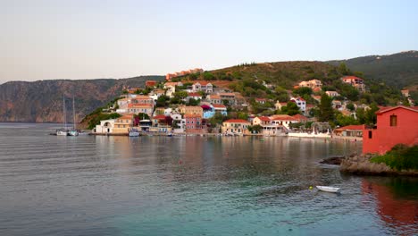 Establishing-view-Coastal-Assos-Picturesque-village-with-colorful-houses,-mediterranean-Scenery