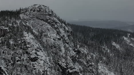 Rock-Face-Mountains-With-Coniferous-Forest-In-Mont-du-Lac-a-L'Empeche,-Quebec,-Canada