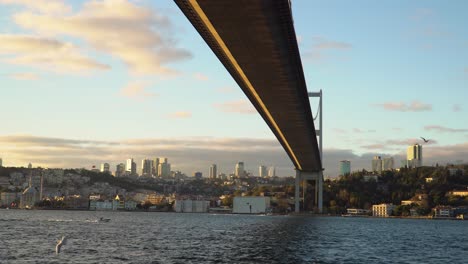 Famous-Bosporus-Bridge-during-Sunset-with-Modern-Skyline-of-Istanbul