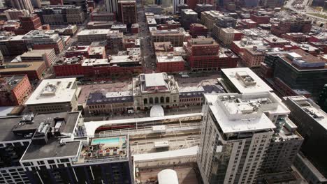 Union-Station-Denver,-Colorado-Surrounded-By-Downtown-Cityscape-Buildings