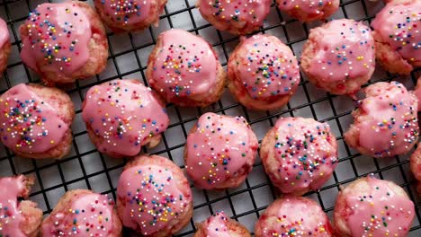 Small-cherry-cordial-cookies-deliciously-topped-with-cherry-icing-and-rainbbow-sprinkles-for-the-holidays