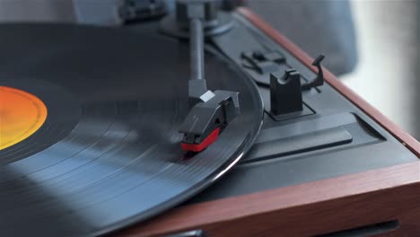 View-of-old-record-player-playing-music-from-a-vinyl-record