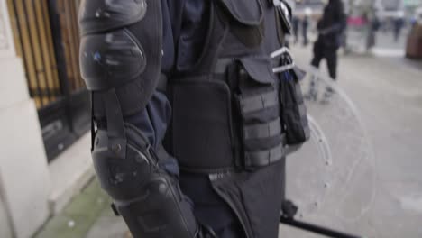 A-Belgian-police-officer-with-gas-mask-dressed-in-full-riot-gear-preparing-for-protests
