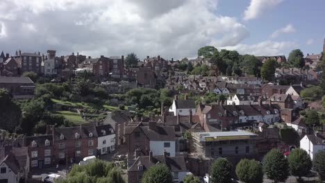 Drone-Slowly-Tracks-Right-Showing-Bridge-and-High-Town,-Bridgnorth-in-Shropshire,-England,-UK---15-Second-Version