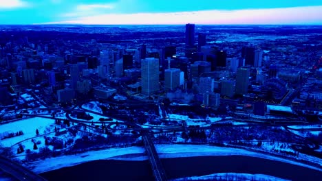 4k-Twilight-Edmonton-Winter-City-Aerial-Reverse-drone-flight-at-the-downtown-South-East-centered-from-the-Fairmont-Hotel-Macdonald-overlooking-the-Low-Level-Bridge-and-the-North-Saskatchewan-River1-2