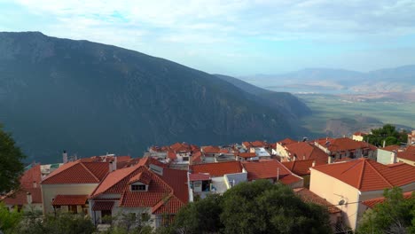Ancient-City-of-Delphi-and-Modern-Red-Tile-Rooftop-Houses