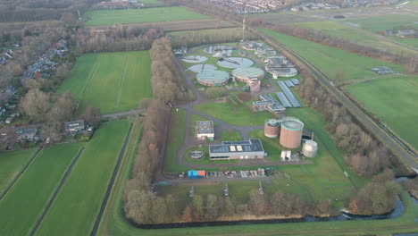Wide-aerial-of-small-sewage-water-treatment-plant-giving-an-entire-overview-of-the-facility