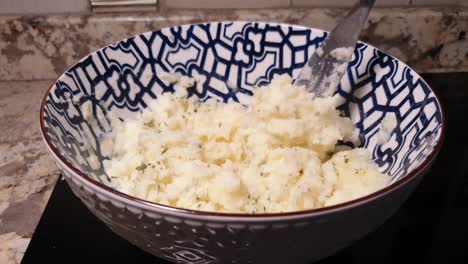 Mash-potatoes-with-Coriander-spice-in-a-Moroccan-pattern-blue-bowl-ready-to-serve-for-the-dinner-table