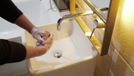 Washing-hands-rubbing-with-soap-man-for-corona-virus-prevention,-hygiene-to-stop-spreading-coronavirus