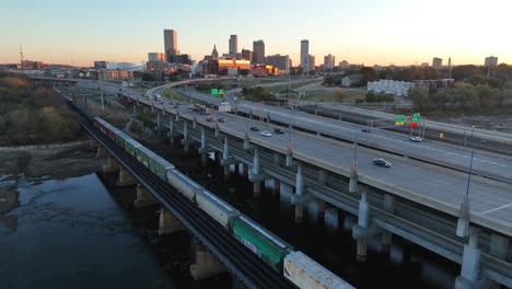 Train-railroad-car-over-bridge-with-Tulsa-Oklahoma-USA-skyline