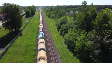 Aerial-following-moving-long-train-with-wagons-for-liquid