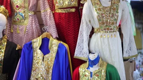 Traditional-costume-arabic-dress-store,-decorated-woman-clothing-exhibition
