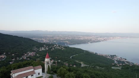 Church-on-hill-with-scenic-bay-in-background
