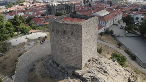 Aerial-footage-of-guarda-old-medieval-city-with-stone-fortifications-and-Christian-Cathedral