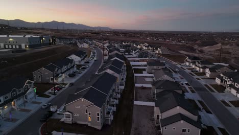 Beautiful-Sunset-Aerial-Establishing-Shot-at-Bringhurst-in-Bluffdale-Utah,-Forward-Tilt-Up