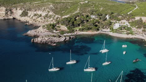 Luxury-and-expensive-yachts-and-boats-docked-on-coast-of-island