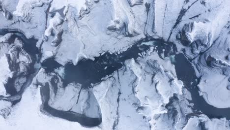 Amazing-Frozen-Landscape-of-the-Fjaðra-rglju-fur-Canyon-in-Iceland---aerial-shot