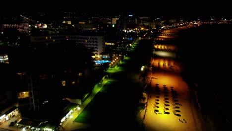 Aerial-over-the-beachside-during-the-night