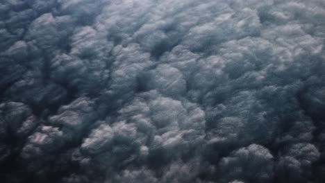 POV-dark-thick-clouds-from-above,-thunderstorm