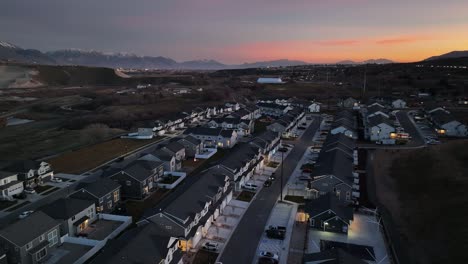 Incredible-Sunset-Aerial-at-Bringhurst-in-Bluffdale-Utah,-Establishing-Truck-Left-Shot