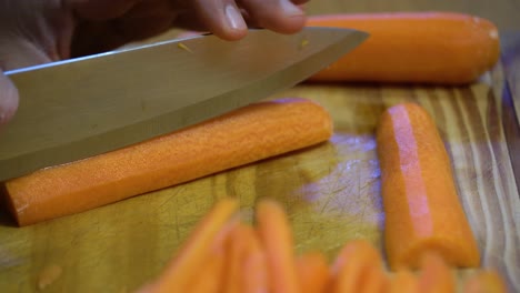 cutting-carrot-into-julienne-on-wooden-board-kitchen-healthy-healthy-diet
