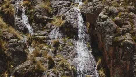 Waterfall-down-cliff,-Pampas-Galeras,-Peru