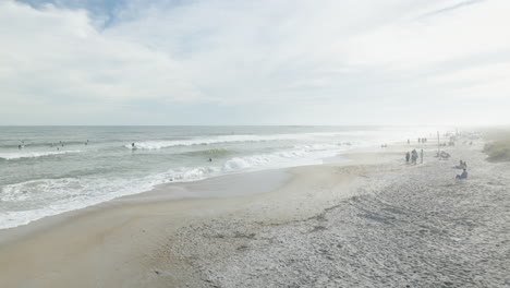 Wrightsville-Beach-Carolina-Del-Norte-Gente-Disfrutando-Del-Sol-Y-El-Agua