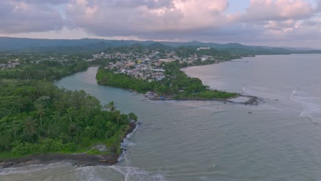 The-Rio-Yeguada-entering-Caribbean-ocean-at-Miches,-El-Seibo