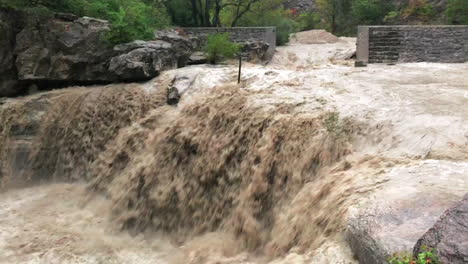 The-flooded-waterfall-of-the-river-Méouge-in-France-during-heavy-rainfall