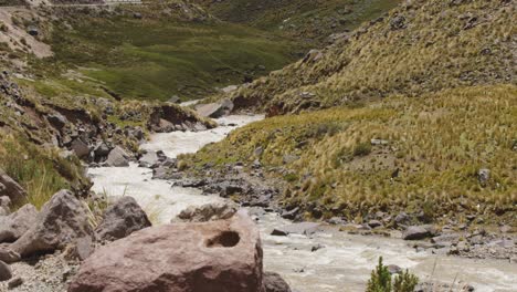 River-flowing-down-hill,-Pampas-Galeras,-Peru