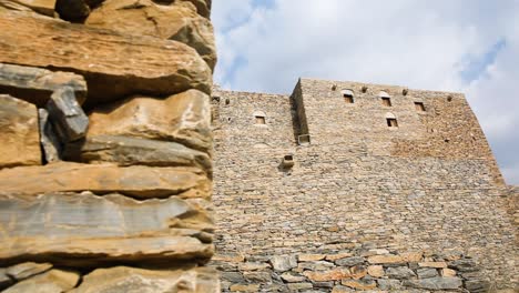 Reveal-shot-of-majestic-antique-stone-building-construction-in-Saudi-Arabia