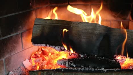 Close-Up-Of-Burning-Log-And-Hot-Embers-In-Slow-Motion