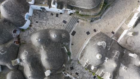 Top-Down-View-of-Homes-in-Alberobello-with-Conical-Roof---Southern-Italy---Apulia
