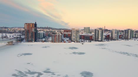 Aerial-view-of-Finnish-city-in-beautiful-soft-winter-light