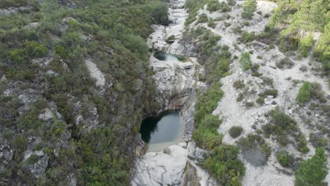 Drone-tilt-shot-of-7-sete-lagoas-in-Geres-national-park-in-Portugal,-landscape