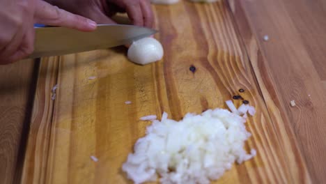 cutting-minced-garlic-into-julienne-on-wooden-board-kitchen-healthy-healthy-diet