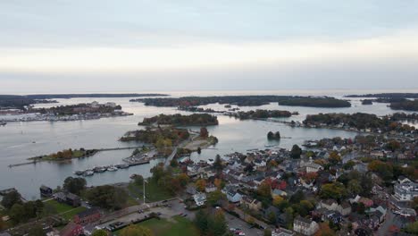 Aerial-view-of-islands-and-the-cityscape-of-Portsmouth,-in-New-Hampshire,-USA---reverse,-drone-shot