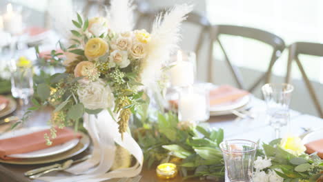 Dining-wedding-table-beautifully-prepared-with-flower-bouquet-and-cutlery-to-accommodate-guests