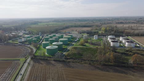 Aerial-view-of-steel-round-Oil-Storage-Tanks,-storage-and-handling-services-for-petroleum-products