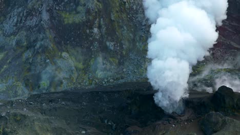 White-smoke-plume-rising-from-geothermal-volcanic-fumerole,-Whakaari