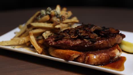 Simple-dish-of-beef-steak-alongside-strips-of-deep-fried-potato