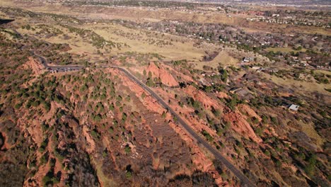 Aerial-View-Of-Countryside-Desert-Road-Near-Garden-Of-The-Gods-In-Manitous-Springs,-Colorado