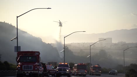fire-trucks-fight-brush-fire-with-helicopter