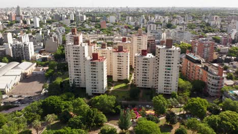 Rising-above-a-residential-complex-in-Buenos-Aires,-Argentina
