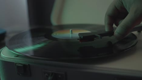 Detail-of-vinyl-spinning-hand-removing-needle-from-record