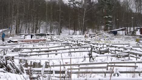 Vacant-Swedish-Sustainable-Community-Farm-Livestock-Enclosures-Covered-In-Snow