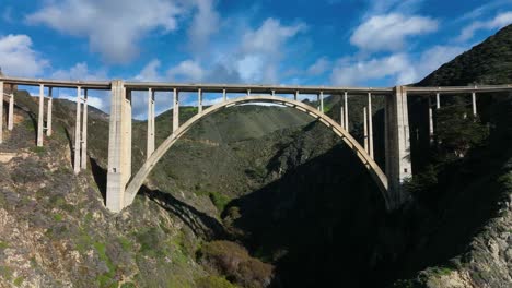Rising-shot-over-Bixby-Bridge-Highway-1-Pacific-Coast,-California