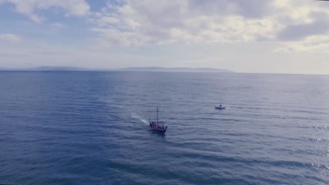 Aerial-Shot-of-Viking-Ship-Sailing-on-the-Ocean-Coming-Towards-Camera