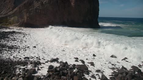 White-foam-waves-breaking-on-shore-of-Whakaari-White-Island